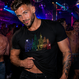Male model wearing a fitted black t-shirt featuring a rainbow rhinestone Boystown Chicago skyline graphic inspired by LGBTQ Pride, Chicago nightlife, disco culture, and gay fashion by Rico Starr