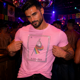 Attractive man wearing a pink rhinestone “El Gay Pride” Lotería-inspired t-shirt featuring a rainbow Pride flag design. LGBTQ+ Pride apparel celebrating Mexican heritage, queer culture, gay nightlife, and Pride festival fashion in a vibrant club setting by Rico Starr