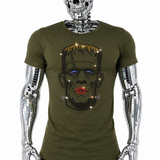 Olive green t-shirt with rhinestone Frankenstein monster graphic featuring red lips, blue eye shadow and blonde hair by Rico Starr