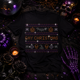 A black graphic t-shirt featuring a 'Gay Christmas' ugly Christmas sweater design in rhinestones by Rico Starr