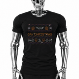 Black t-shirt with "Gay Christmas" rhinestone text and Halloween-themed ugly-sweater-style graphics including pumpkins, bats, ghosts, and skulls by Rico Starr