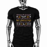 Black t-shirt with "Gay Christmas" rhinestone text and Halloween-themed ugly-sweater-style graphics including pumpkins, bats, ghosts, and skulls by Rico Starr