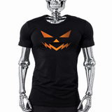 Black t-shirt with metallic orange jack-o'-lantern face graphic, minimalist pumpkin Halloween shirt by Rico Starr
