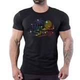 Black t-shirt with "Palm Springs" rainbow rhinestone script text, palm tree, and desert sunset graphic by Rico Starr
