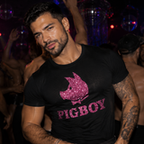 Black men’s t-shirt with pink glitter Pigboy graphic and pig logo, edgy gay clubwear by Rico Starr