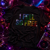 A black graphic t-shirt with the phrase 'I FEEL SO FREE' in colorful rainbow rhinestone lettering by Rico Starr