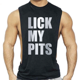 Male model wearing a black deep armhole muscle tank shredder top featuring bold “Lick My Pits” lettering in silver a sexy gay nightlife and fetish-inspired fashion style by Rico Starr